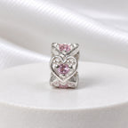Berloque Mini Separador Corações com Zircônia Rosa Bebê Prata 925
